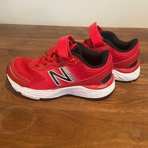 Toddler boy sneakers size 11. New balance red Velcro. Never worn.